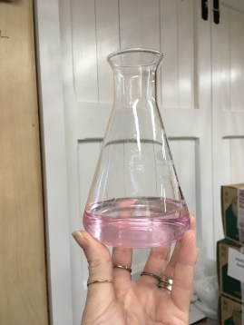 Pink in flask